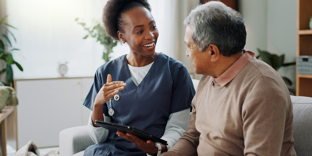 Healthcare provider having conversation with patient